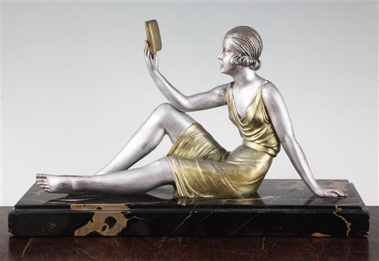 Chiparus. A painted bronze figure of a lady, The Reader, H. 8.5in.